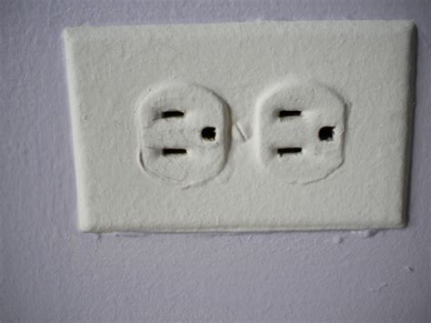 painting over electrical outlets